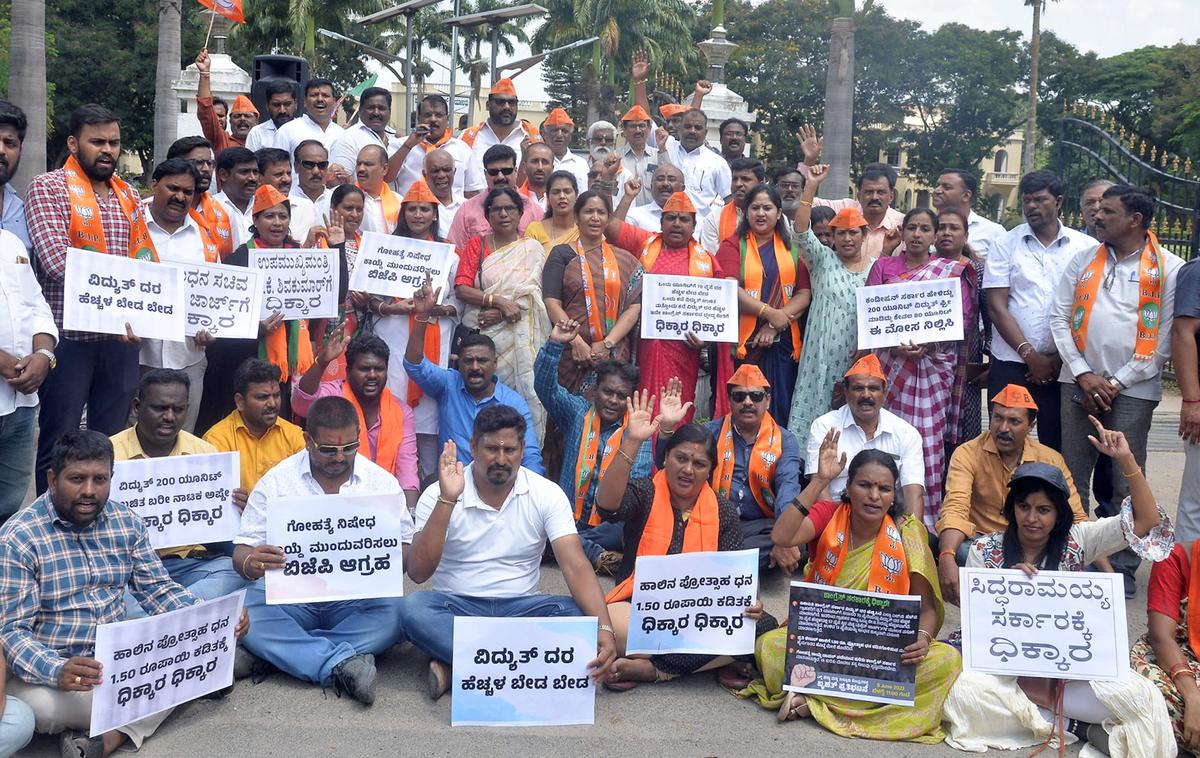 BJP workers protest against Congress govt.'s decision to restrict free  power and proposal to withdraw anti-cow slaughter law - The Hindu