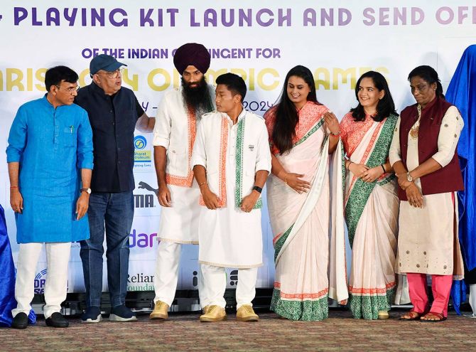 Our Olympians Deserve Better: A Peek Into India’s Olympic Dress Code Disaster 90 Union Sports and Youth Affairs Minister Mansukh Mandaviya, Indian Olympic Association (IOA) President PT Usha and TASVA owner Tarun Tahiliani during the unveiling of the ceremonial dress